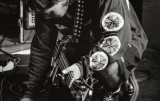 bass guitars, drums; vocals